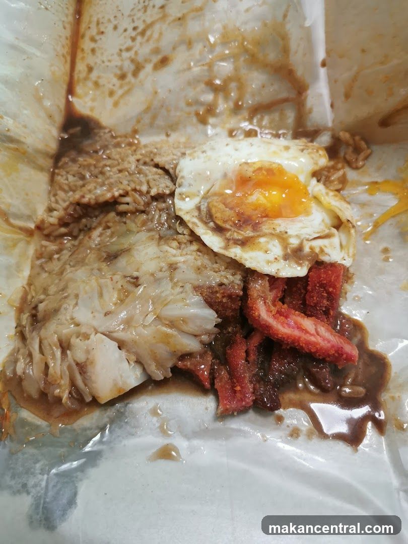 Rice dish with fried egg and meat