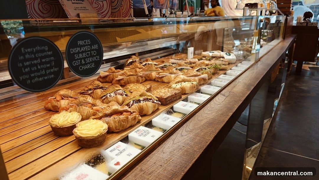 Croissants and Pies in Display Case