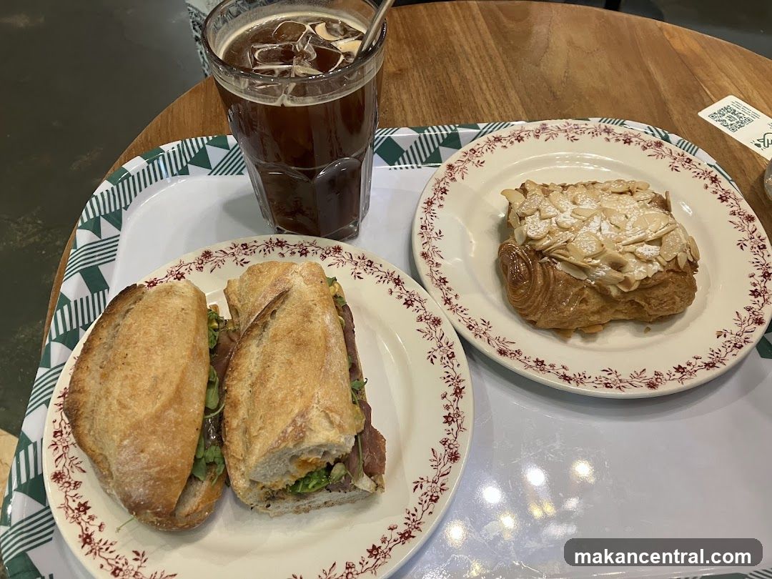 Sandwich and pastry with iced coffee