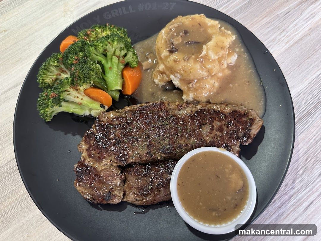 Steak with mashed potatoes and vegetables