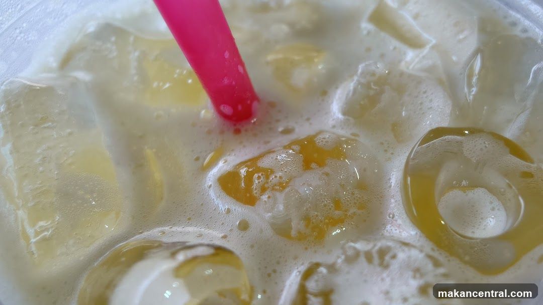 Iced Beverage with Pink Straw