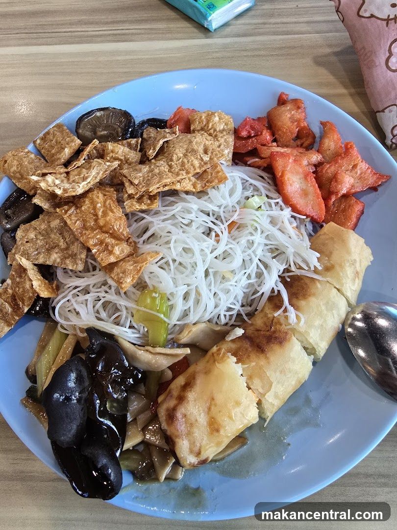 Plate of Noodles with Various Toppings