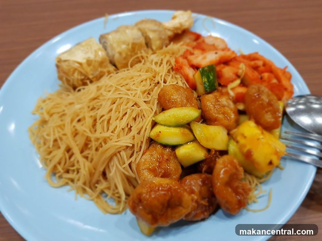 Plate of noodles with various toppings
