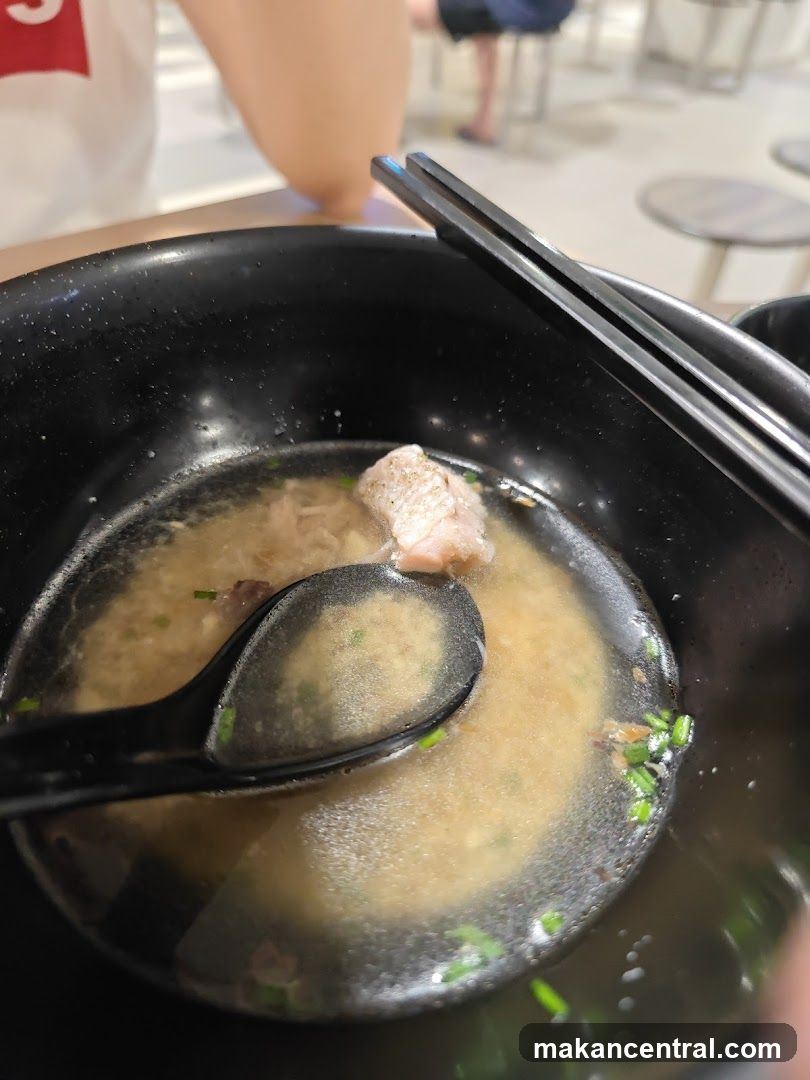 Bowl of Congee with Meat and Chives
