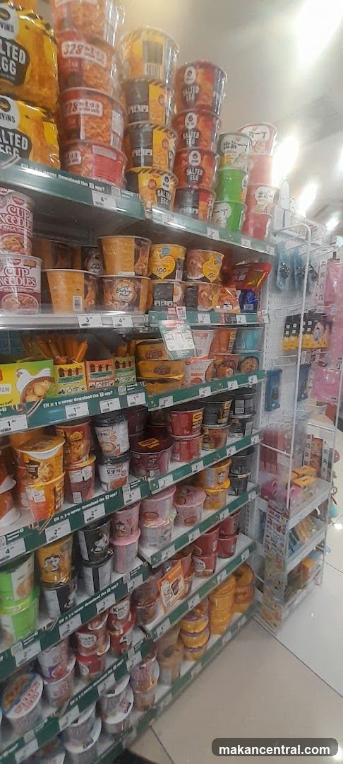 Shelves stocked with instant noodles and snacks