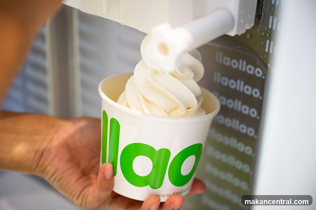 Yogurt being dispensed into a cup