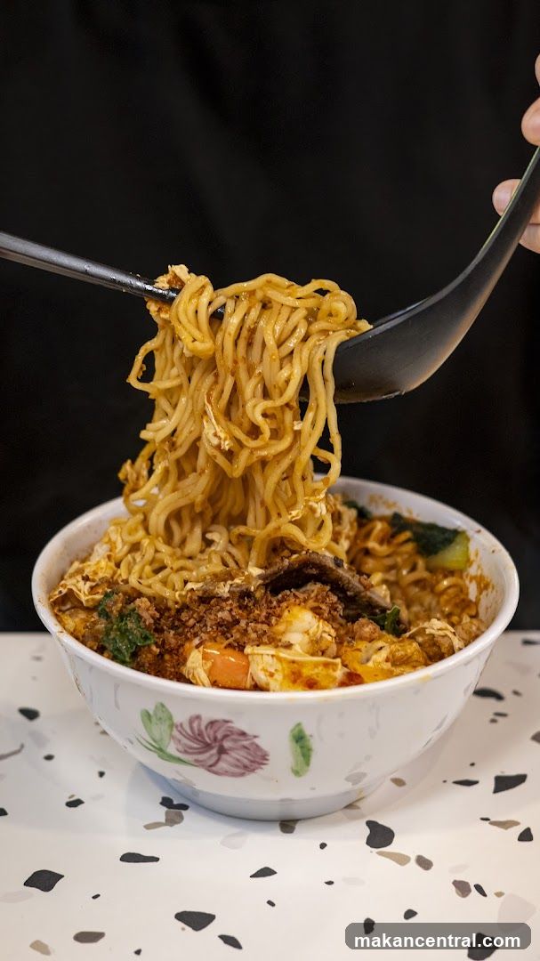 Noodles being lifted from a bowl