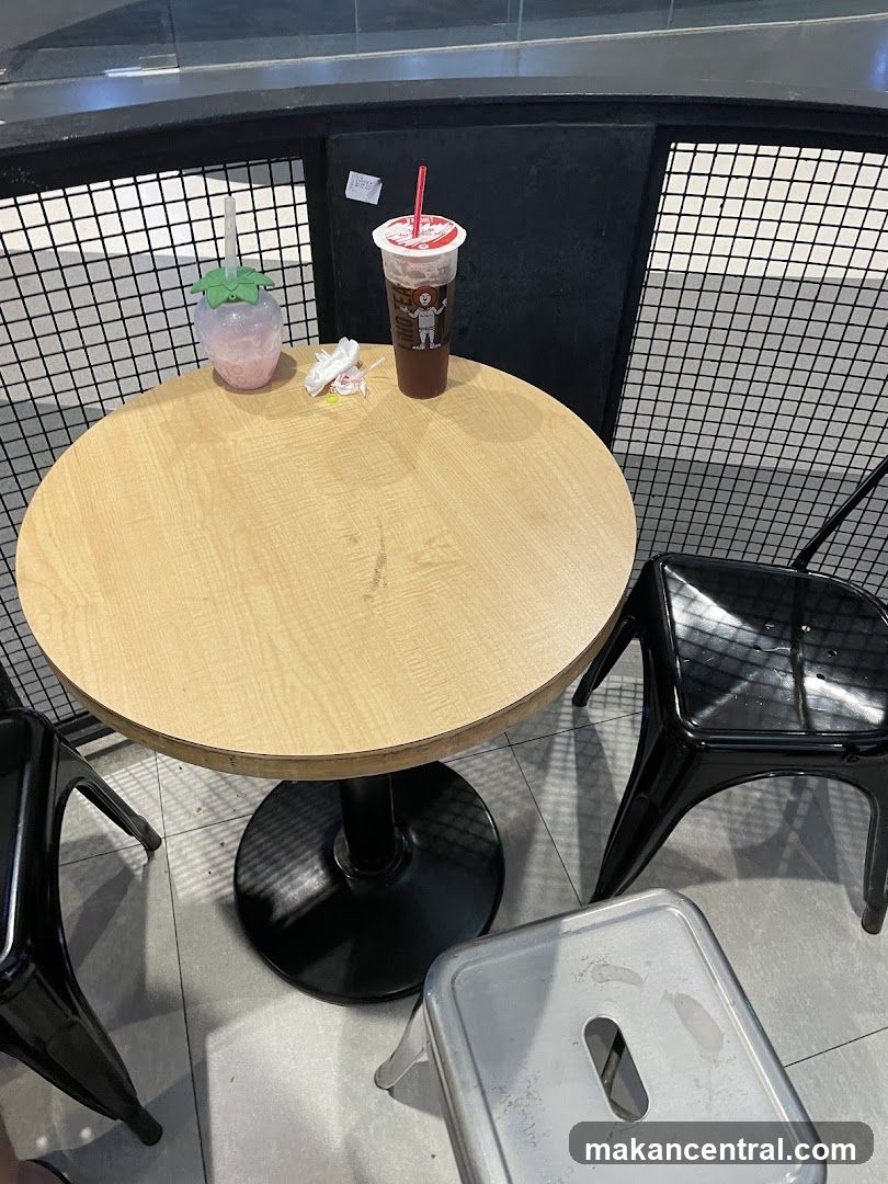Table with Drinks and Chairs
