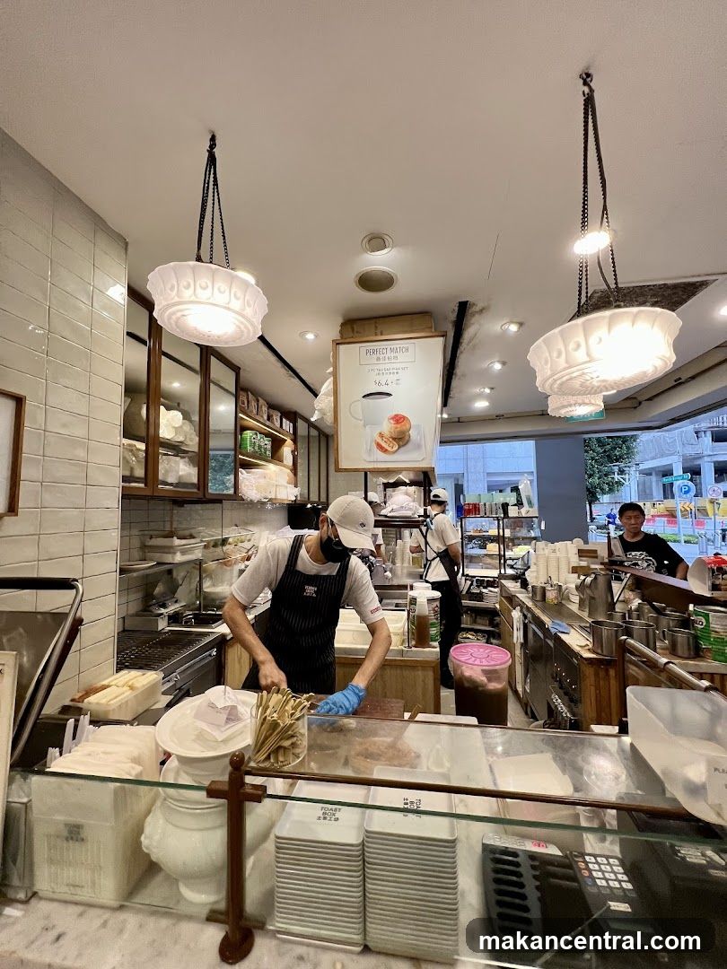 Cafe Interior with Staff Preparing Food