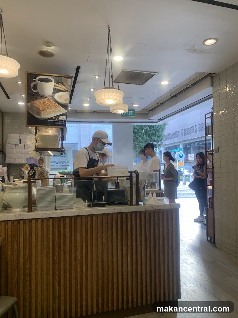 Cafe Counter with Staff and Customers