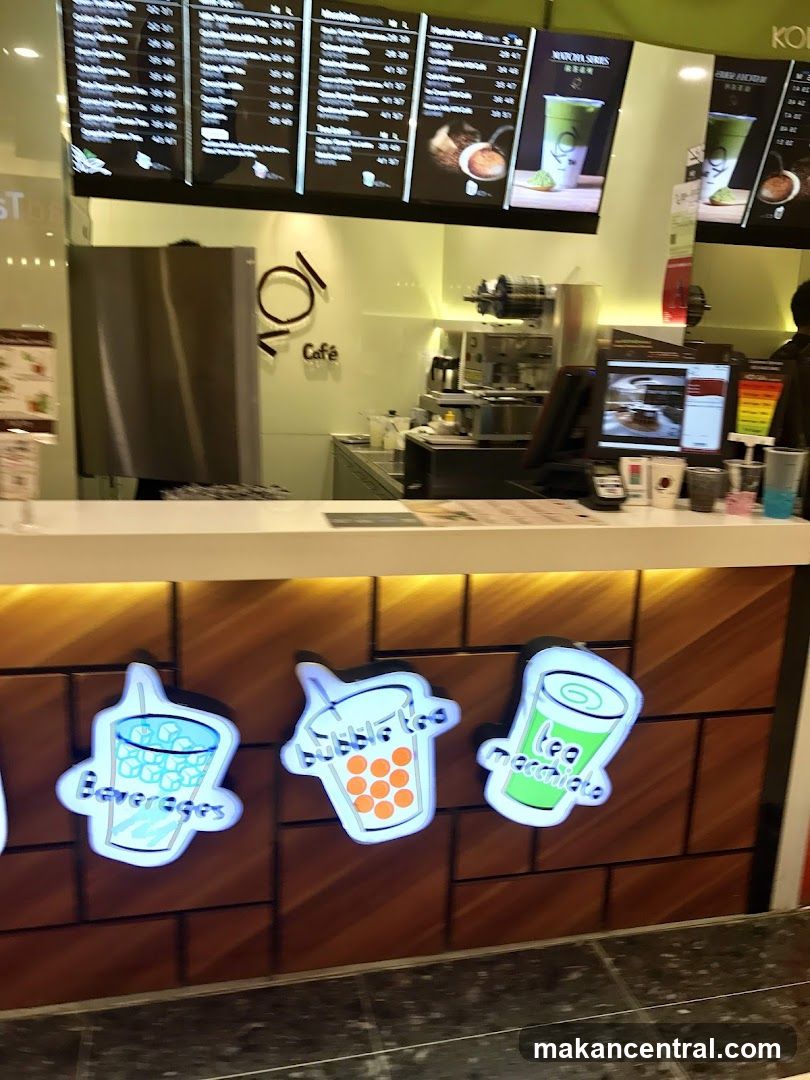 Cafe Counter with Menu Boards and Drink Displays