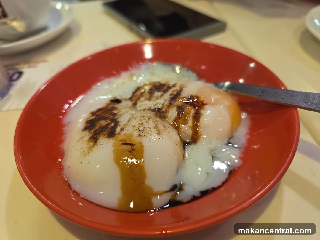 Soft-boiled eggs with soy sauce and pepper