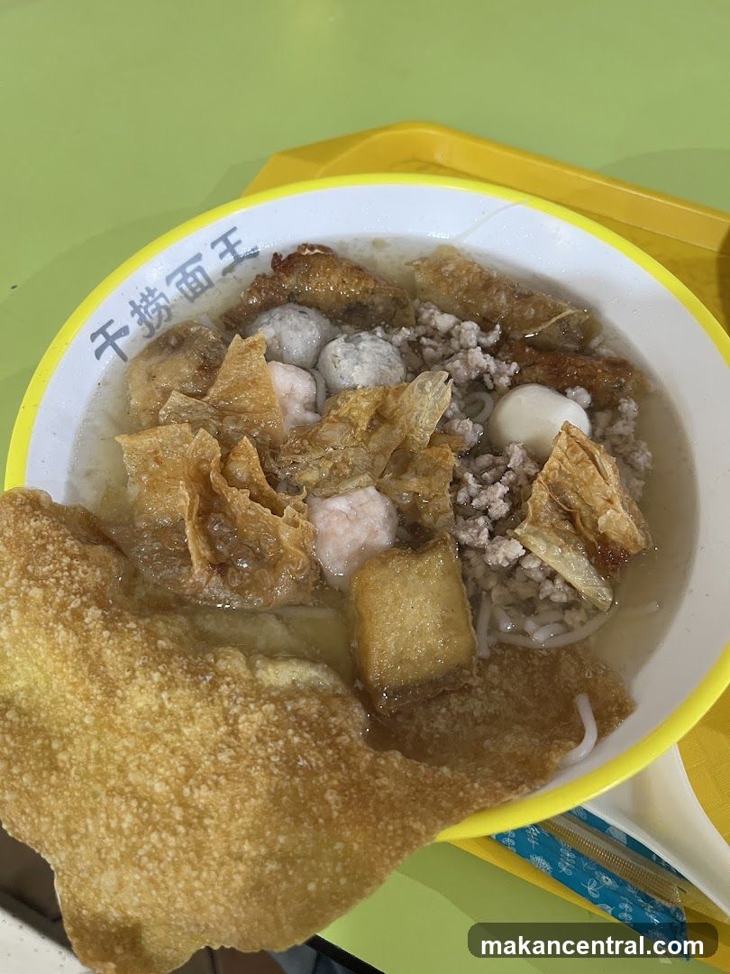 Noodle Soup with Meatballs and Fried Wontons
