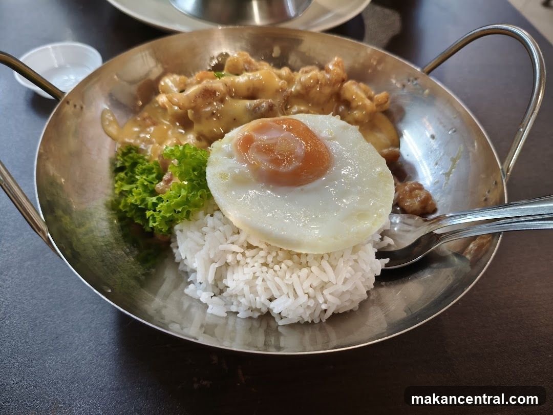 Chicken with cheese sauce and rice