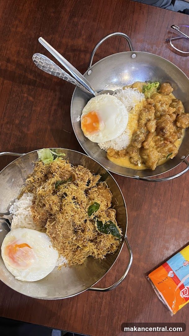 Two Rice Dishes with Fried Eggs