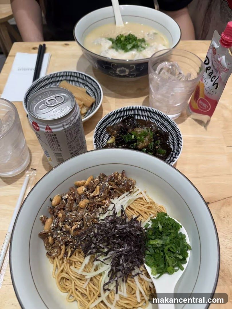 Noodle Dish with Sides and Drink