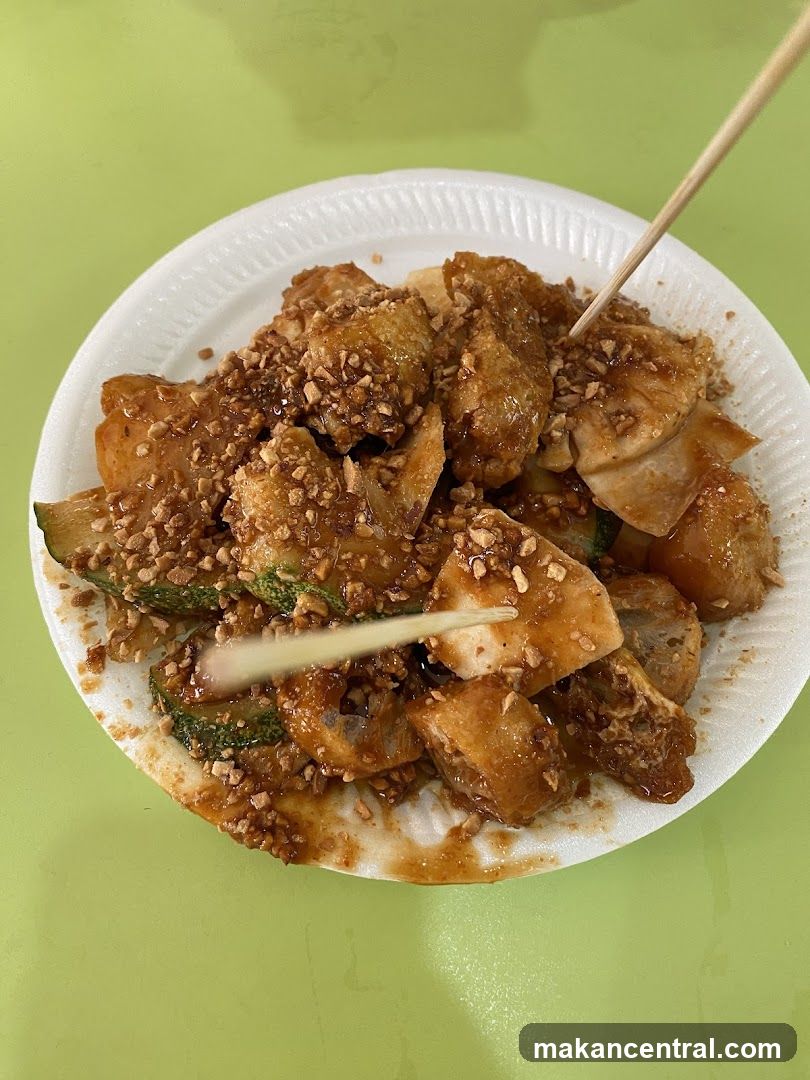 Fried Food with Sauce and Peanuts