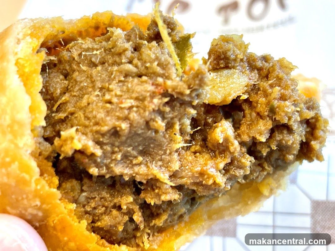 Close-up of a savory pastry filling
