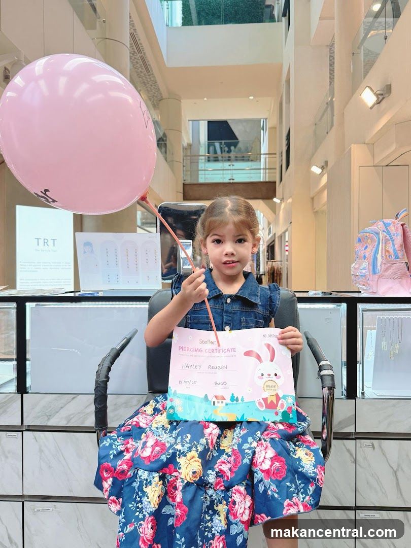 Girl with Piercing Certificate and Balloon