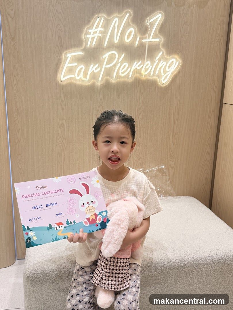 Girl Holding a Piercing Certificate
