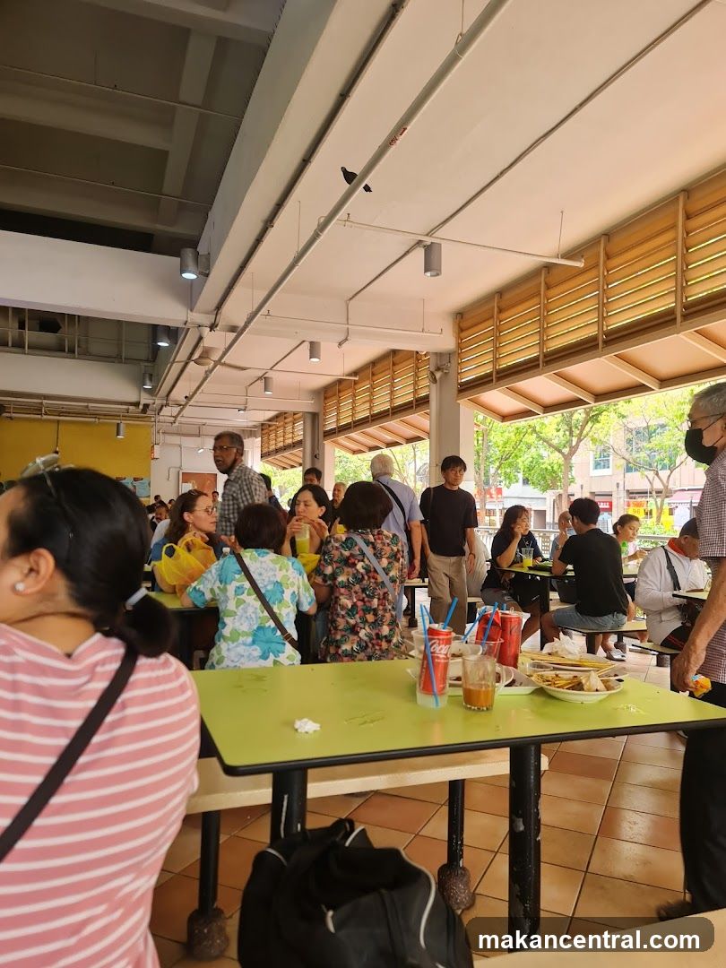 People eating at a food court