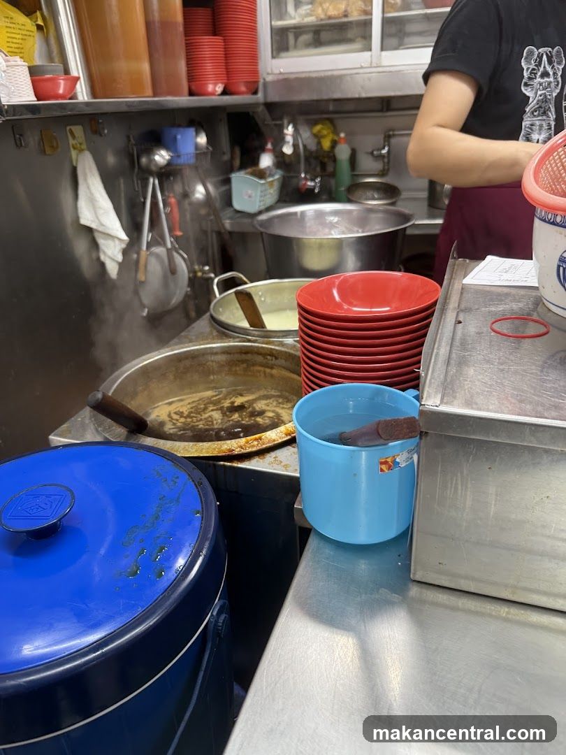 Kitchen Counter with Cooking Pots and Utensils