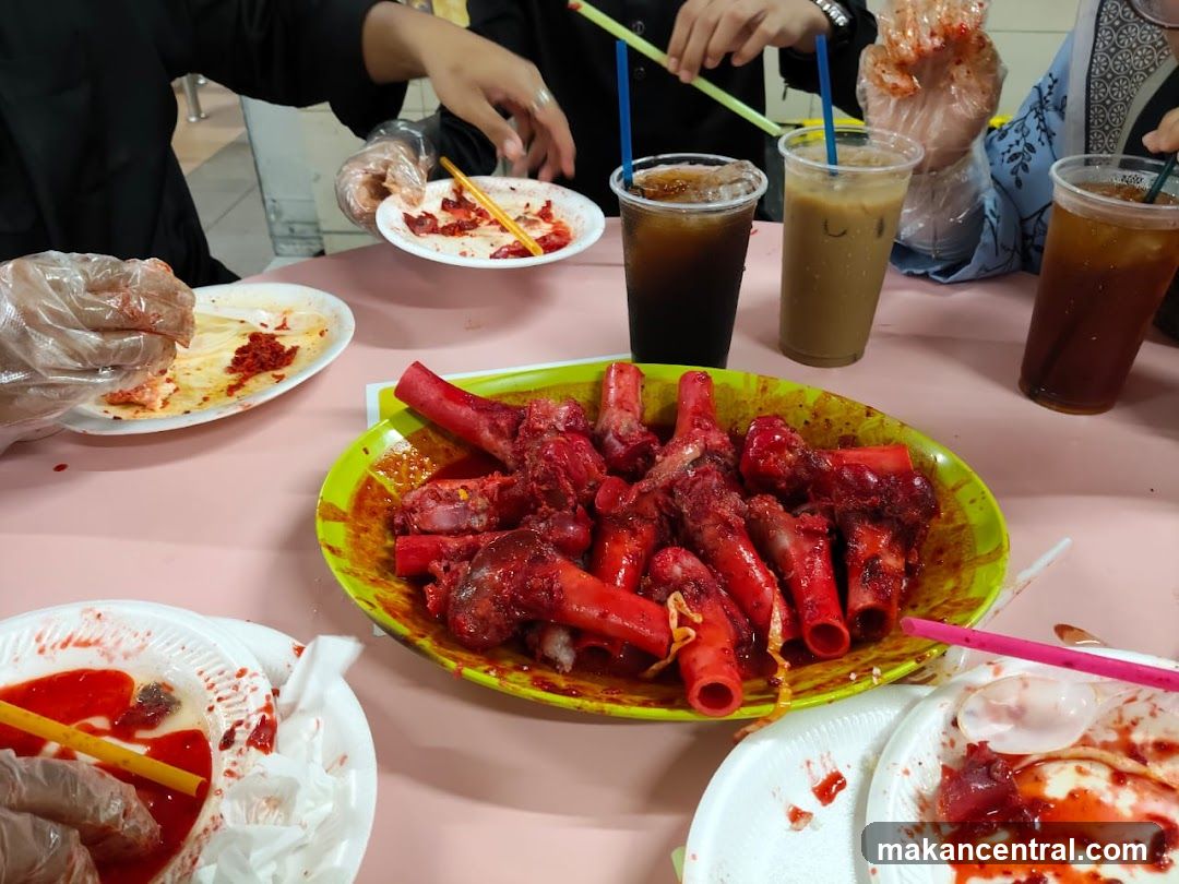 People Eating Bones with Drinks