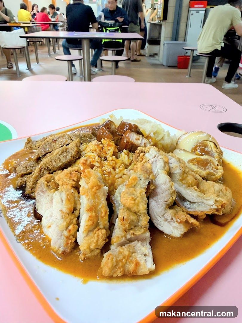 Plate of food with various meats and rice