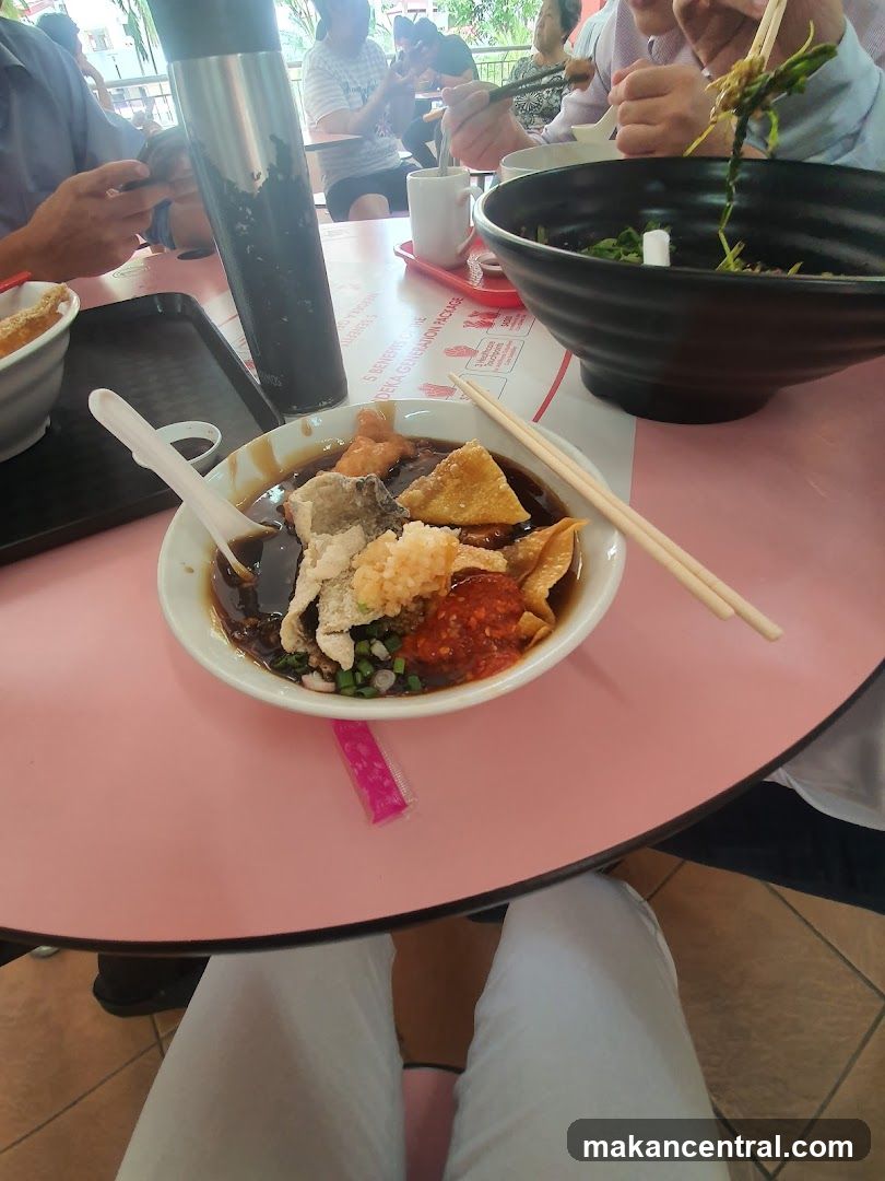 People eating at a food court
