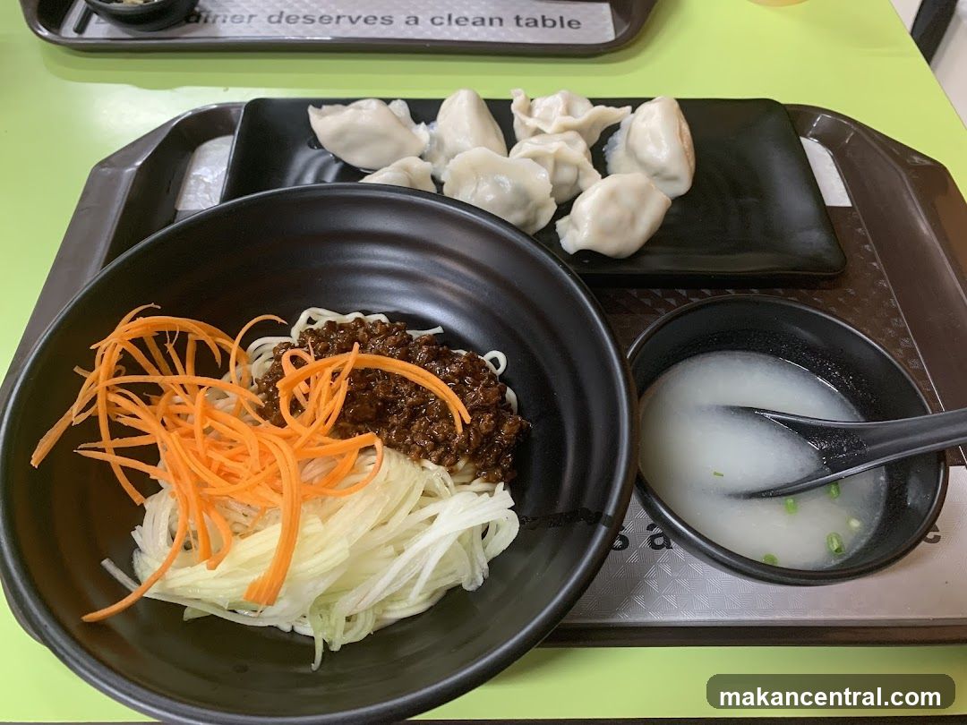 Noodles with dumplings and soup