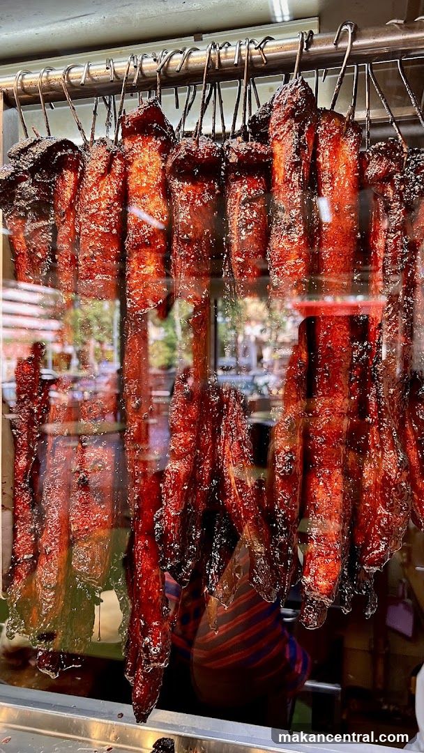 Roasted Meats Hanging in a Display