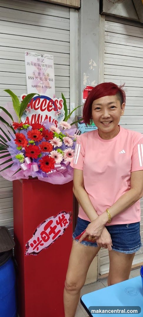 Woman Posing with Flower Arrangement
