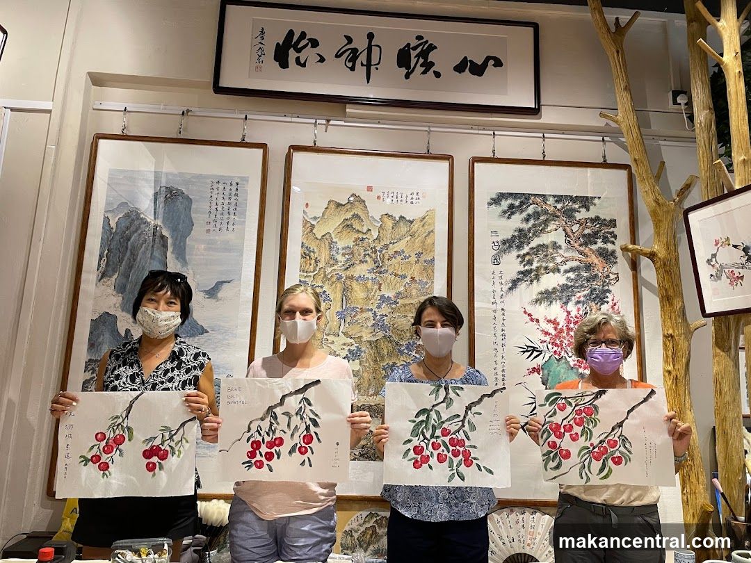 People holding artwork