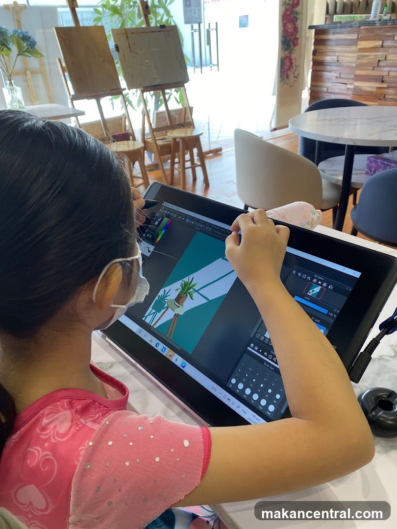 Child drawing on a tablet