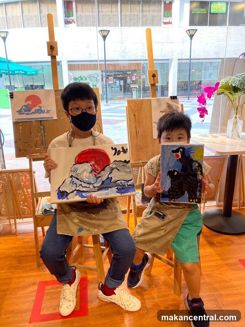 Children Showing Paintings
