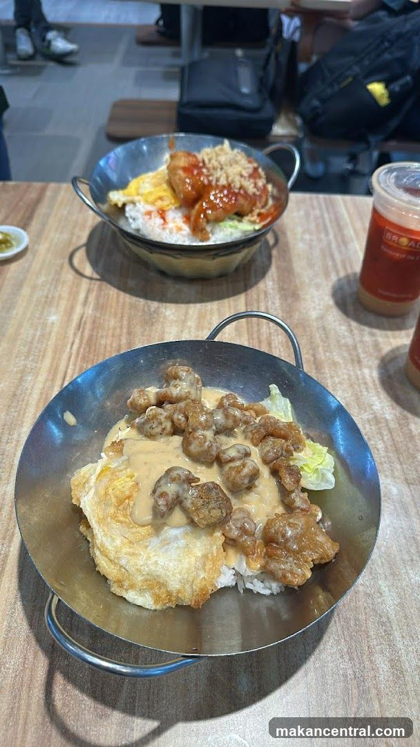 Two Bowls of Rice with Toppings