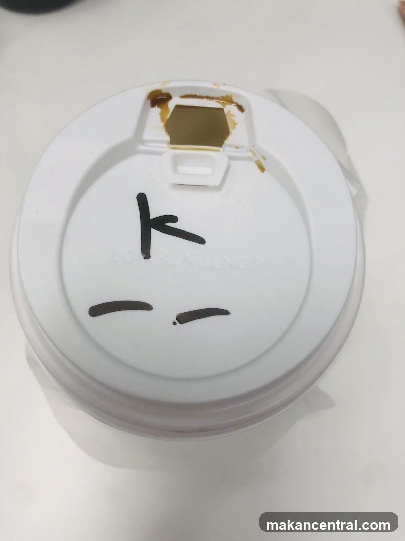 Coffee cup lid with markings