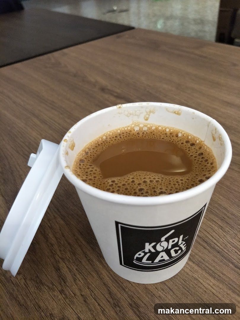 Coffee in a branded cup