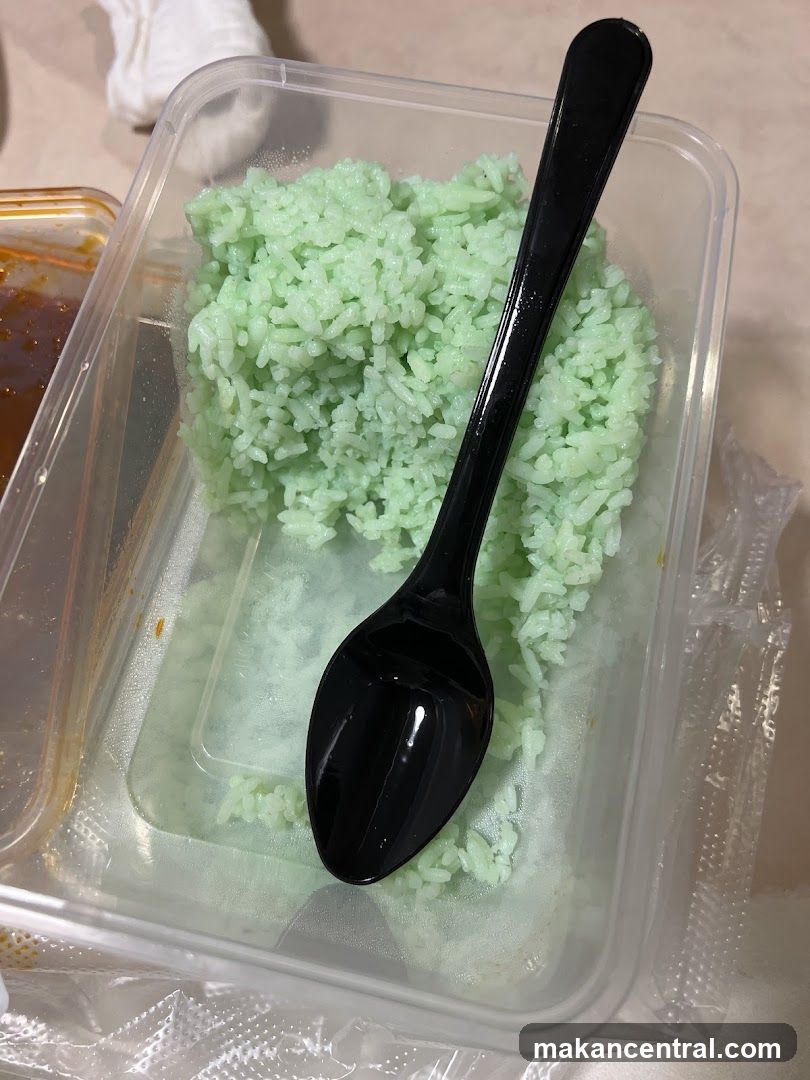 Green Rice in Takeout Container