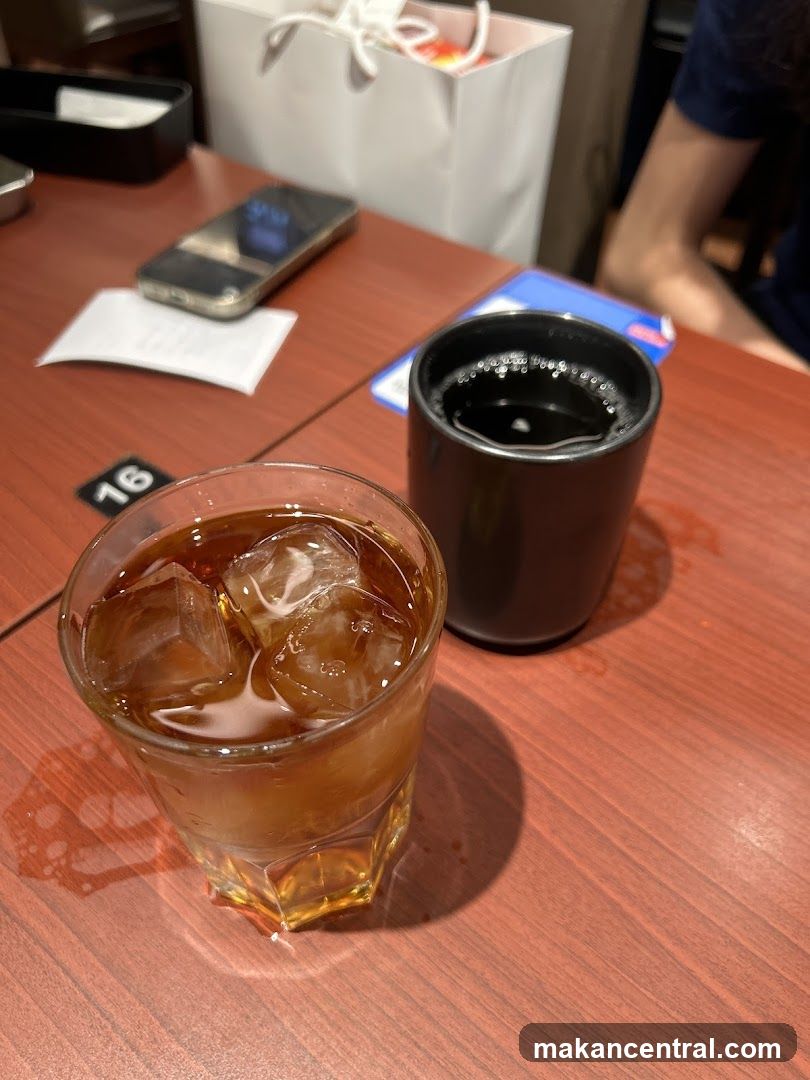 Table with drinks and phone