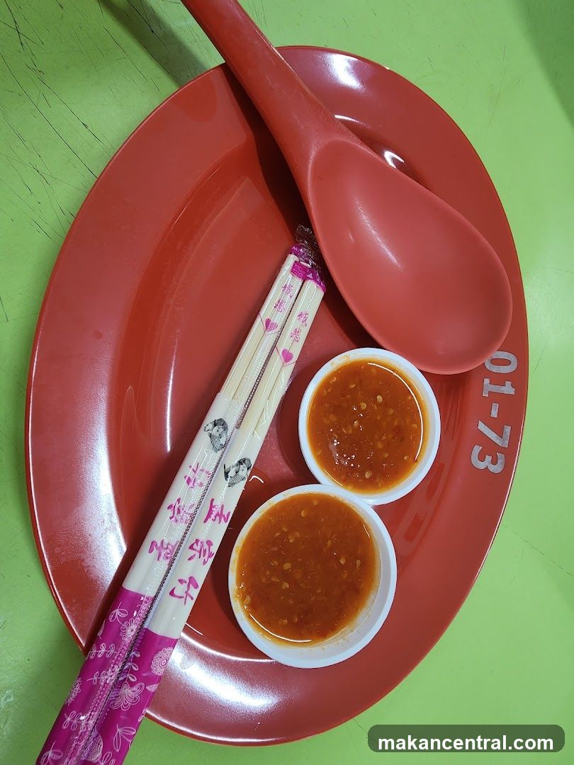Chopsticks and Chili Sauce
