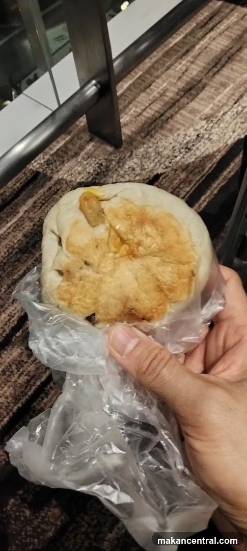 Hand holding a pastry