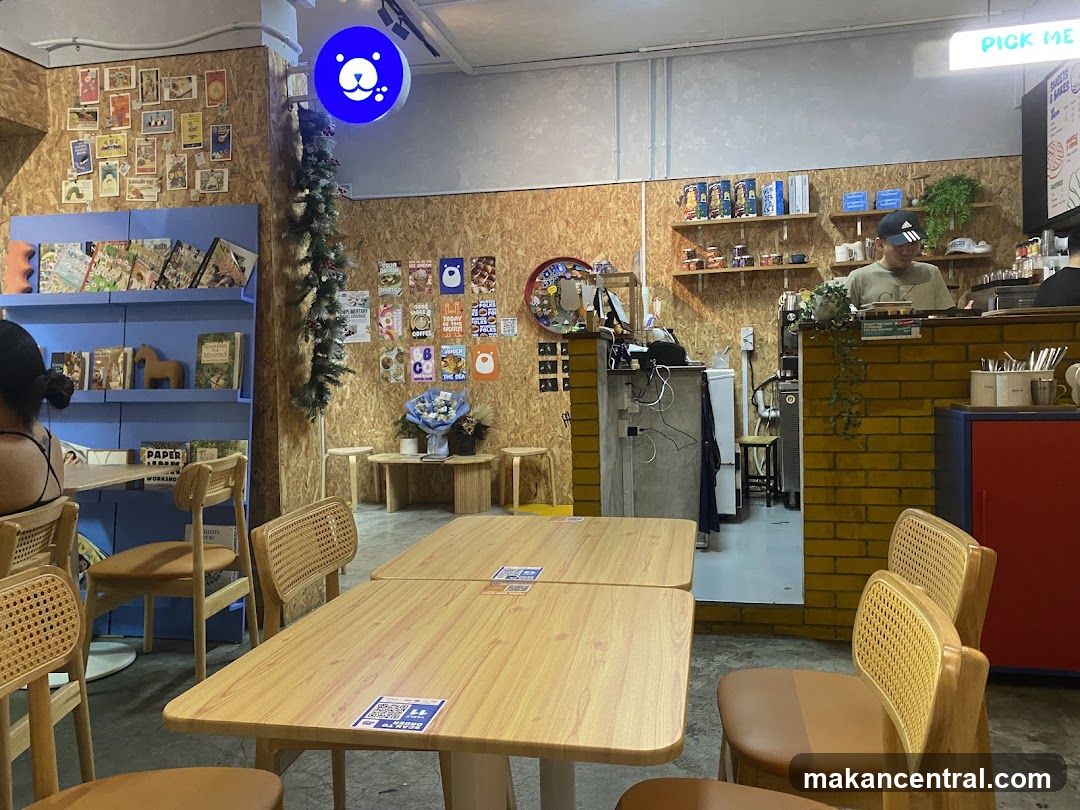 Cozy Cafe Interior with Bookshelves and Seating