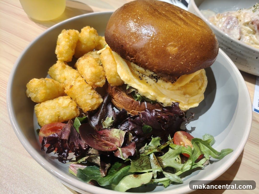 Breakfast Burger with Tater Tots and Salad