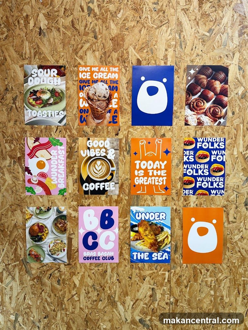 Assortment of Posters on a Wooden Wall