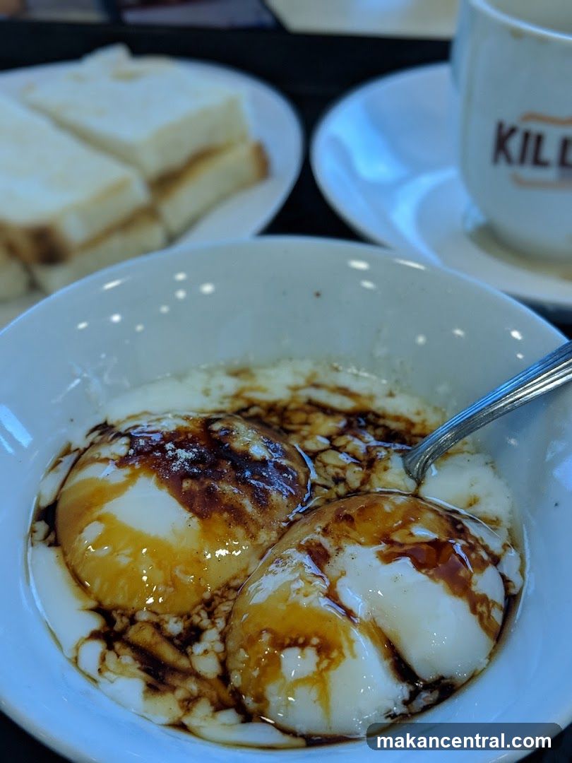 Soft-boiled eggs with toast and coffee