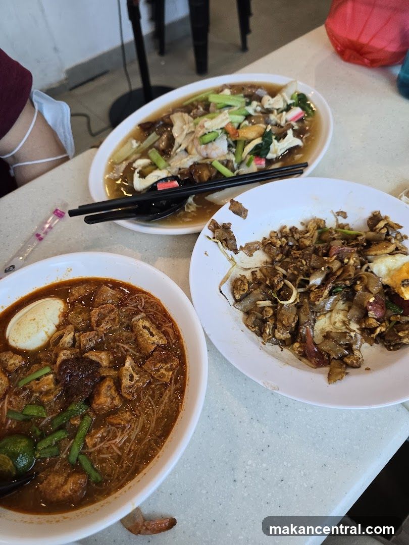 Three Plates of Food on a Table