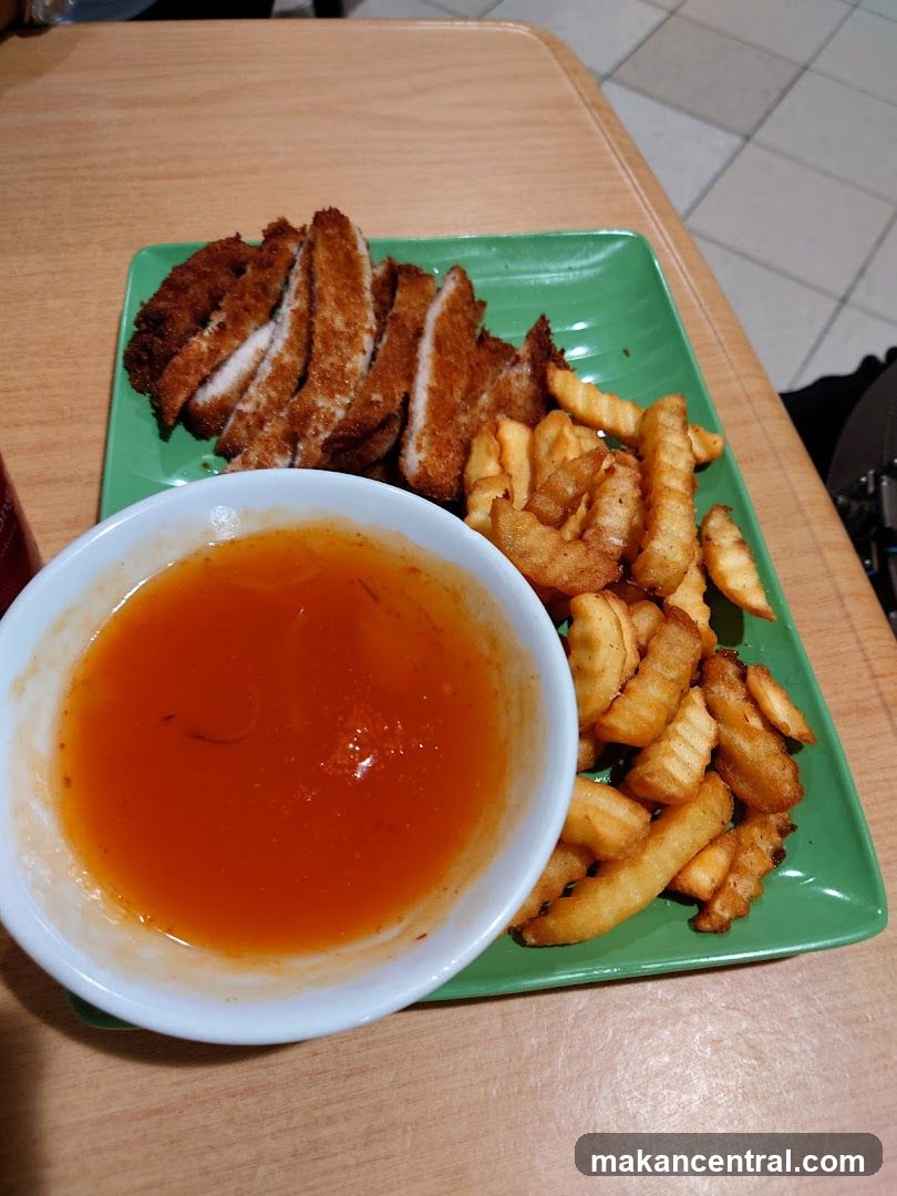 Breaded Pork Cutlet with Fries and Dipping Sauce