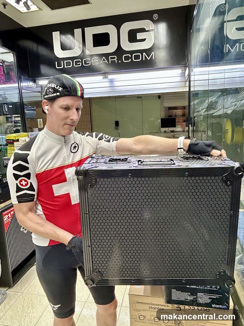 Man holding a case in a store