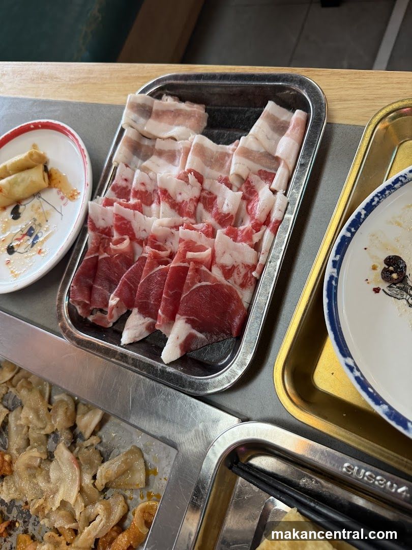 Sliced Meat and Spring Rolls